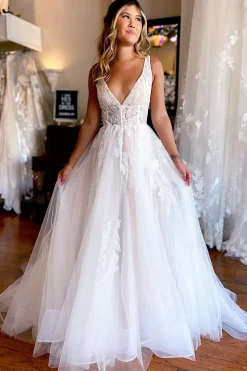 Ivory A-Line Deep V-Neck Backless Long Wedding Dress with Lace