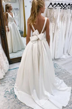 Ivory A-Line Deep V-Neck Long Wedding Dress with Bowknot