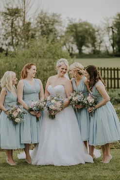 V-neck A Line Blue Chiffon Tea-Length Bridesmaid Dress with Pleated